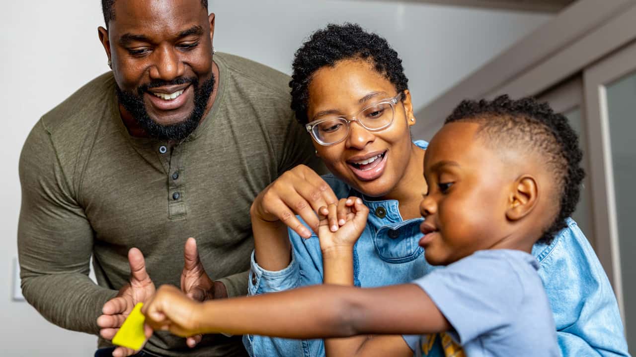 Ravonne Byrd smiles as she enjoys time with her family
